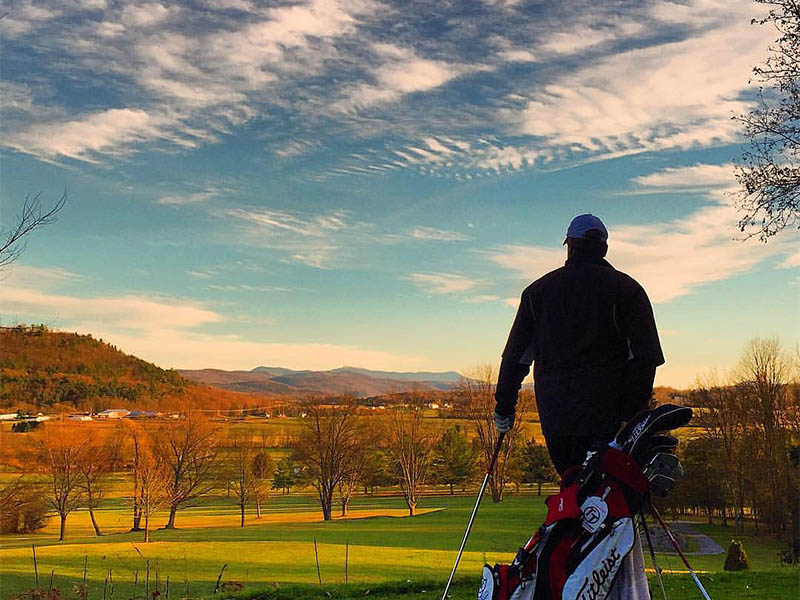 Rocky Ridge Golf Club Member planning a shot