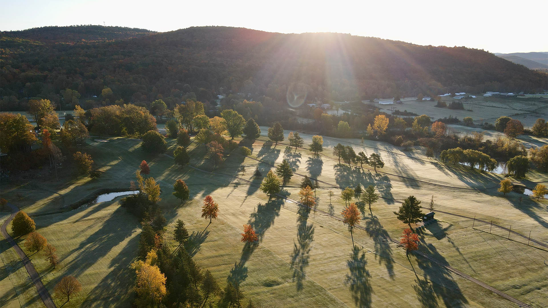 Rocky Ridge Golf Club aerial view with mountain in the background